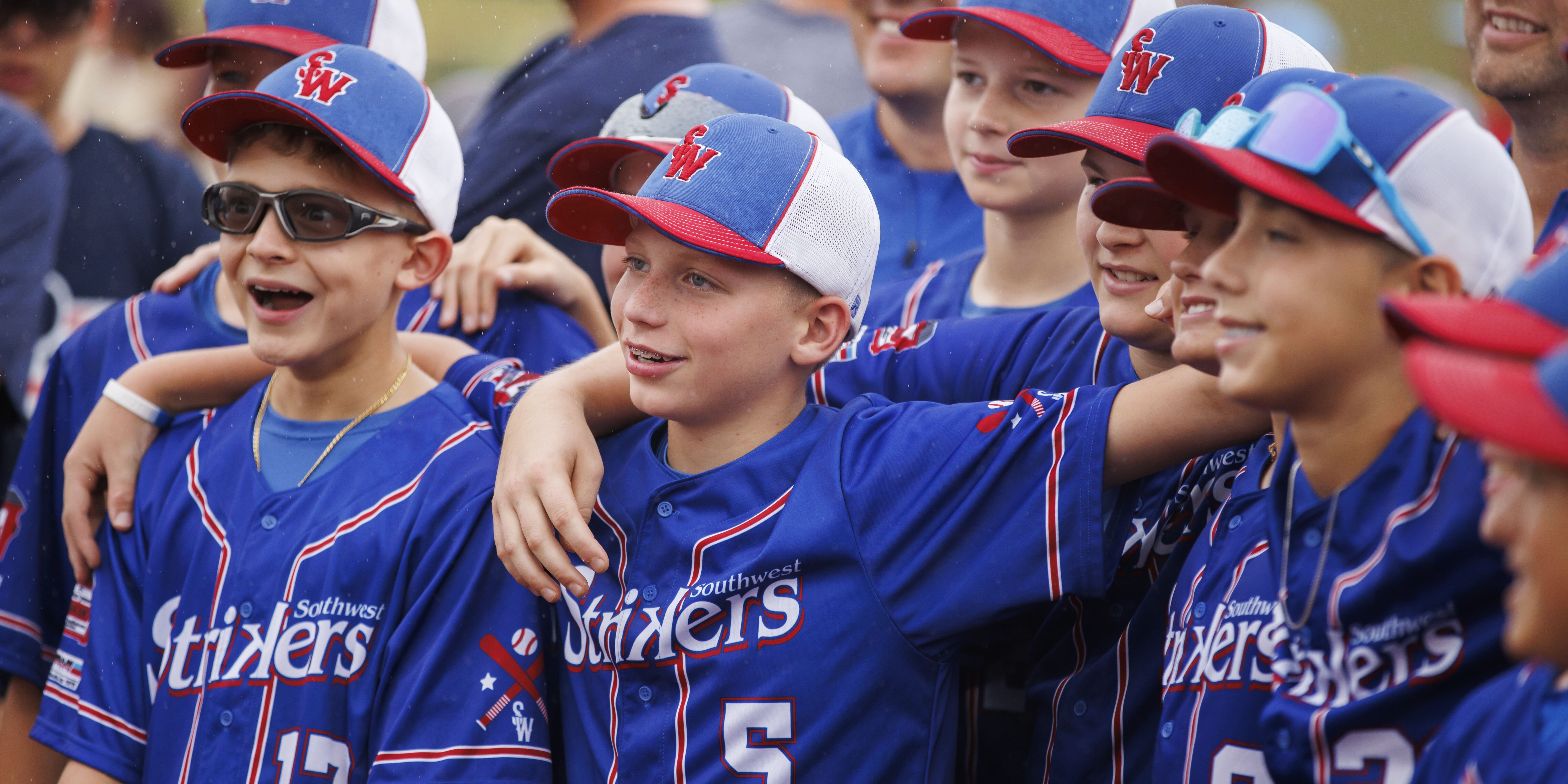 ballplayers enjoying a baseball tournament at The Ripken Experience™